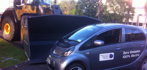Perspective - NRC Electric Vehicle and Huge Volvo Digger Bucket